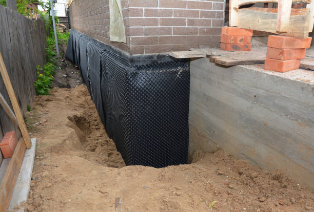SJ Waterproofing Pros technician performing targeted Foundation Crack Repair assessment in Arlington Heights, WA